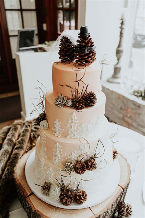 Naked Wedding Cake For Winter With Pincone Topper And Lavender Hot