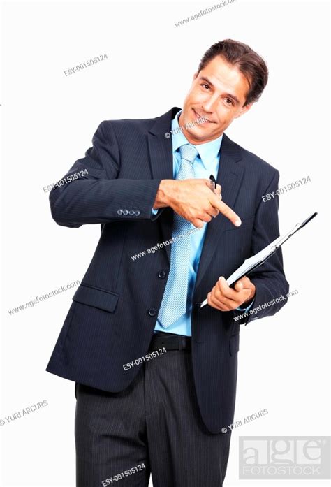Portrait Of A Successful Mature Business Executive Pointing At