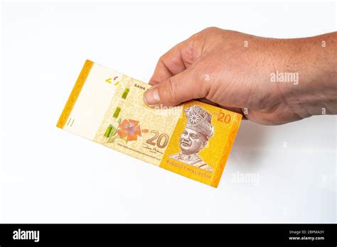 A 20 Malaysian Ringgit Banknote On A White Surface Stock Photo Alamy