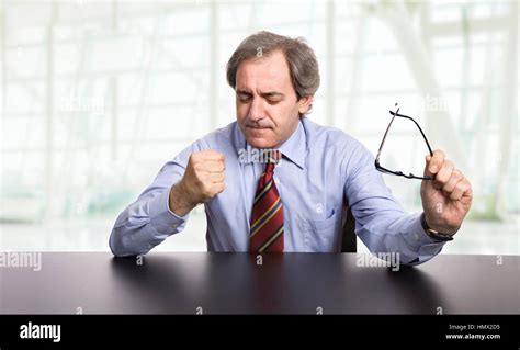 Mature Business Man On A Desk At The Office Stock Photo Alamy