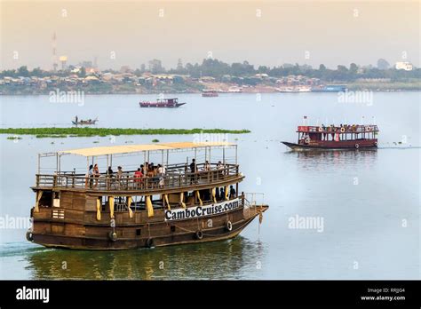 Sunset Cruise Boats At The Confluence Of The Tonle Sap And Mekong