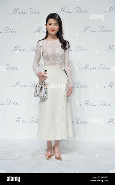 Chinese Actress Liu Yifei Poses On The Red Carpet For The Opening Of