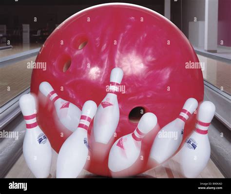 Fl6436 Brian Hillier Over Sized Bowling Ball Knocking Down Pins Stock