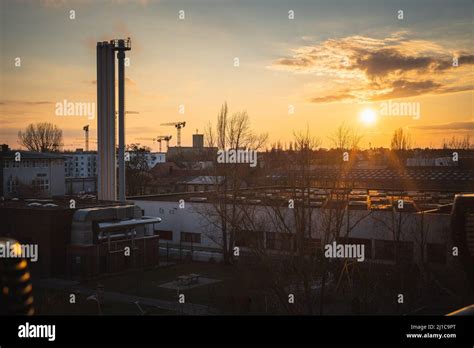 A Breathtaking View Of A Colorful Sunny Sky Over A City Stock Photo Alamy