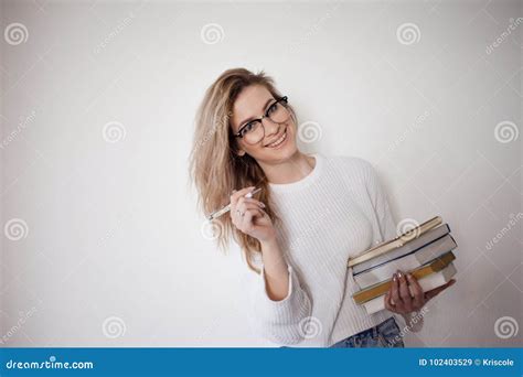 Beautiful Girl Happy Went To College Passed Exams Cute Blonde With Stack Of Books In Hand