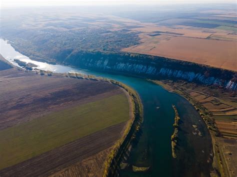 Premium Photo Aerial View Of River And Fields