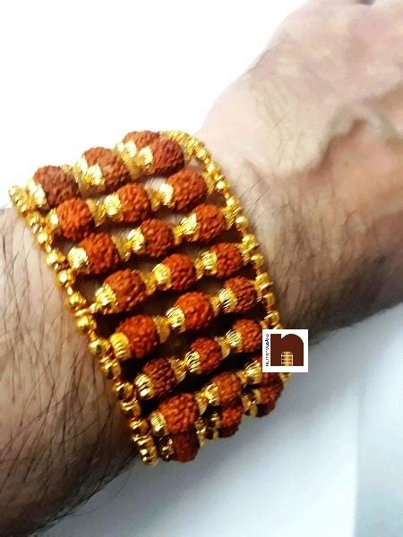 Mukhi Rudraksha Bracelet With Designer Gold Plated Caps Lines