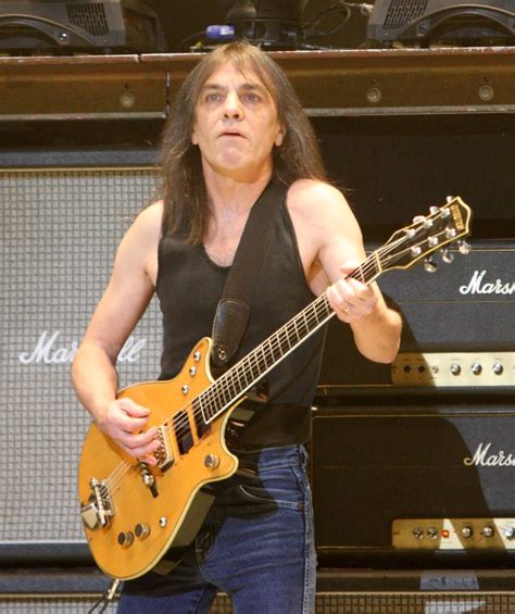 AC/DC Guitarist and Co-Founder Malcolm Young Dies at 64 - TheDailyDay