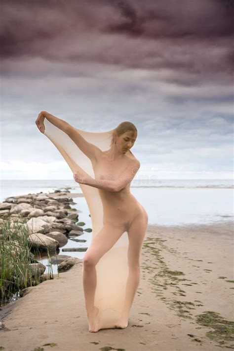 Nude Model Posing In Stocking In The Sea At The Beach Stock Image Image Of Beautiful Naked