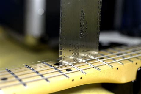 How To Adjust The Action On An Electric Guitar Robots Net