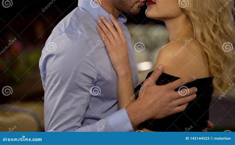 Seductive Woman And Man Hugging And Petting Each Other In Park Love