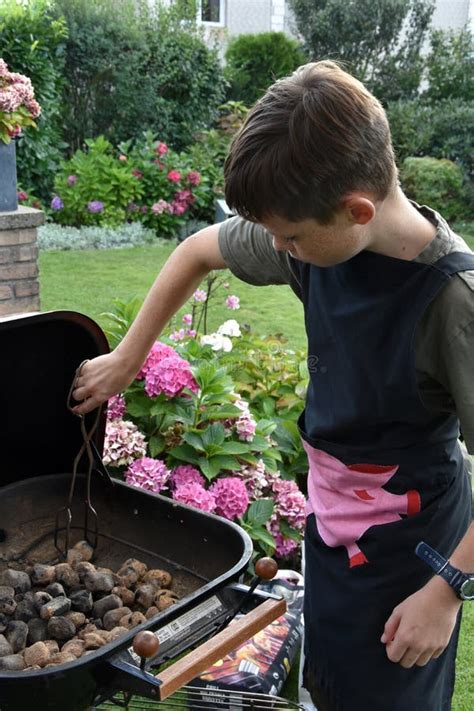 Teenage Boy As A Grill Master Doing Barbecue Stock Image Image Of