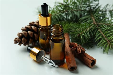 Premium Photo | Aromatherapy concept with pine oil on white