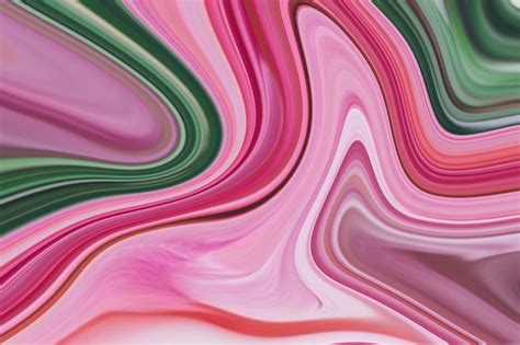 Premium Photo | A colorful background with a swirl of pink and green