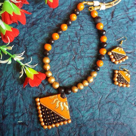 Terracotta Jewellery Set With Orange And Black Beads