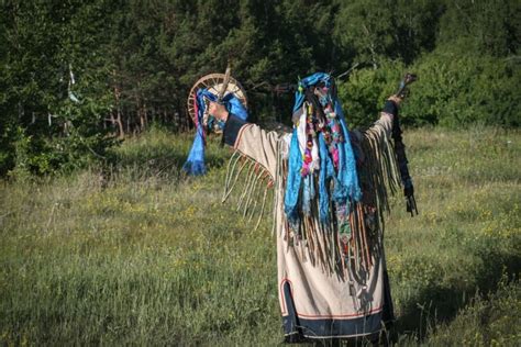 shaman doing authentic ritual of summoning spirits. • LightSong School ...