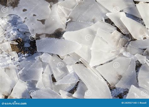 A Thick Layer Of Ice Formed On The Territory Of The Field Stock Photo