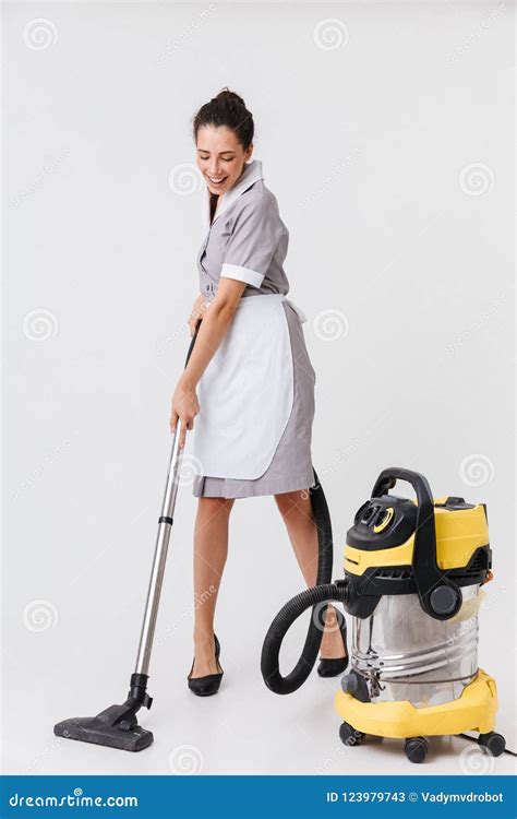 Full Length Of A Cheerful Young Housemaid Stock Image Image Of