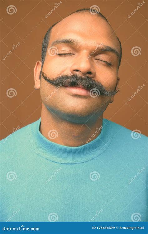 Indian Man With Mustache Against Brown Background Stock Image Image Of Shot Adult 173696399