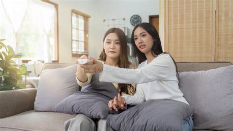 Asian Lesbian Woman Couple Enjoy Watch TV Together In House And Feel Happy Watch Movie On