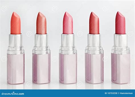 Color Lipsticks Arranged In Line Isolated On White Stock Photo Image