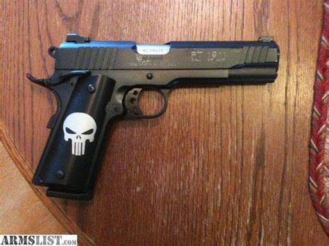 ARMSLIST - For Sale: Taurus PT1911 + Punisher Grips