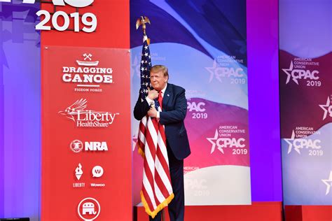 CNN Mocks Trump For Hugging American Flag At CPAC | The Daily Caller