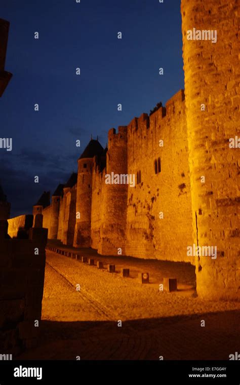 French Cité de Carcassonne medieval citadel by night Stock Photo - Alamy