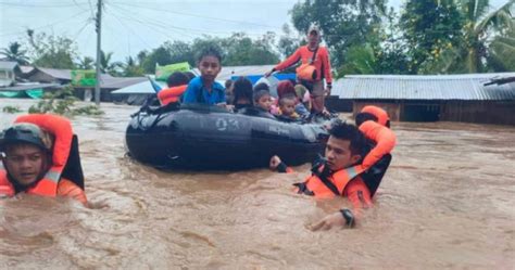 Floods and landslides in Philippines' south kill at least 31 ...