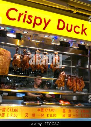 Chinatown Duck Chef Arranging Rows Of Peking Crispy Duck Hanging Air