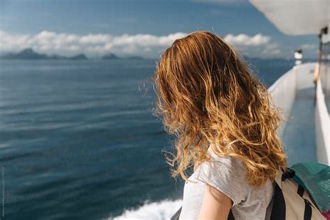 Woman On The Ferry By Stocksy Contributor Andrey Pavlov Stocksy