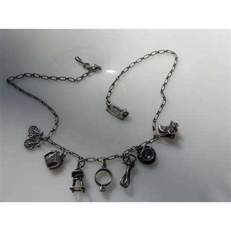 Sterling Silver Charm Necklace Silver Chain Featuring Seven Charms