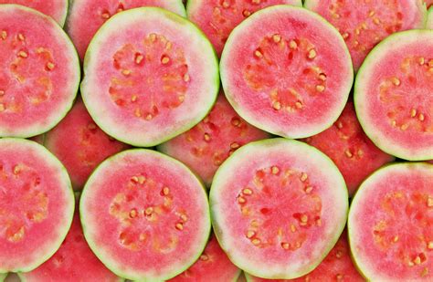 Slices of pink guava as background | Just Made