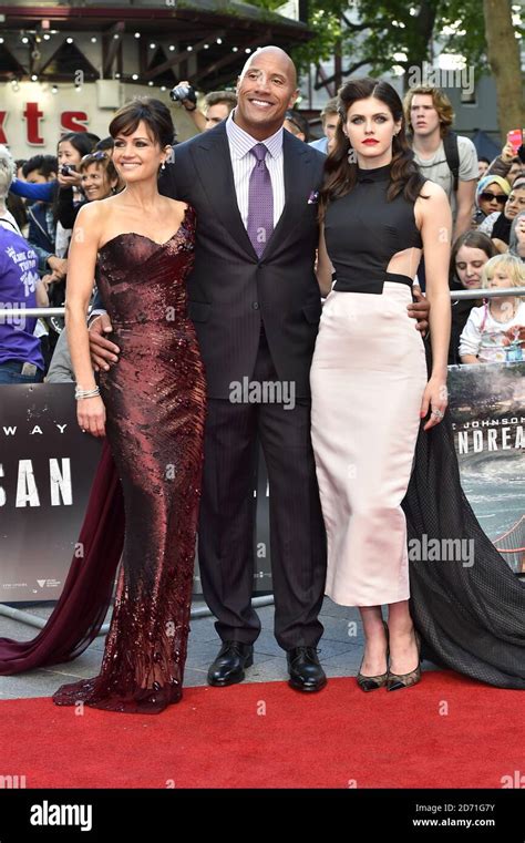 Left To Right Carla Gugino Dwayne Johnson And Alexandra Daddario