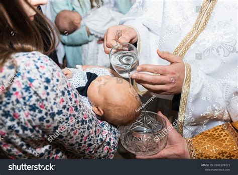 Baptism Water Poured On Head Of Infant Over 91 Royalty Free Licensable