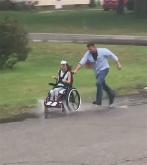 Dad Pushes Daughter In Wheelchair Through Puddles Faithpot