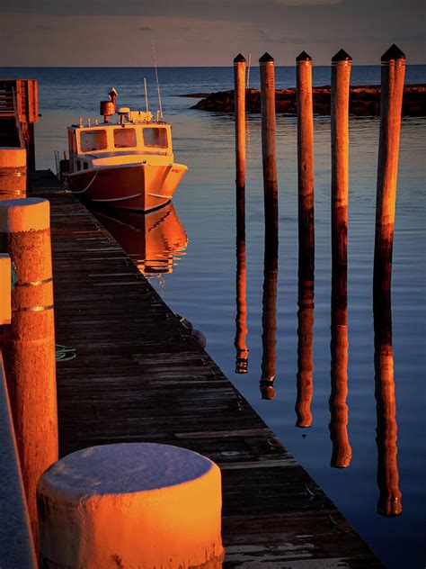 Fishing Boat At The Rock Harbor Photograph By Darius Aniunas Fine Art