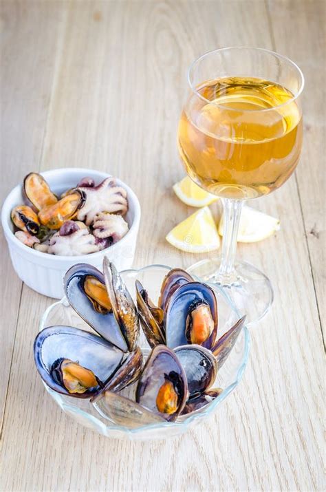 Mussels With A Glass Of White Wine On The Wooden Table Stock Image Image Of Alcohol Dish