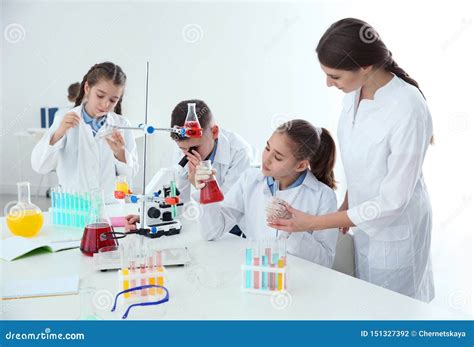 Pupils With Their Teacher At Chemistry Lesson Stock Photo Image Of