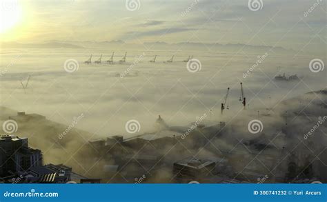 Drone Buildings And City In Fog Sea And Sunrise In Clouds With