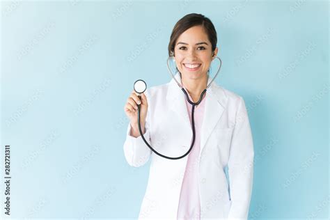 Female Doctor With Stethoscope On Isolated Background Stock Photo