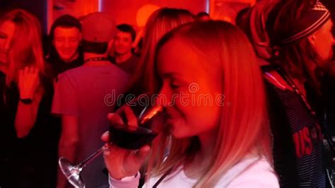 Blonde Girl Smoking And Dancing At A Party At The Stock Footage Video