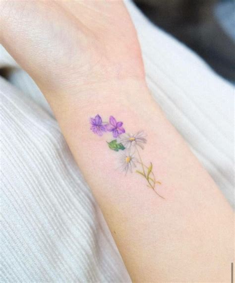 20 Adorable Flower Wrist Tattoo Ideas That Will Grow On You