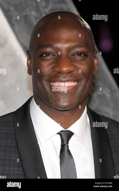 Adewale Akinnuoye-Agbaje attends the world premiere of Thor - The Dark ...