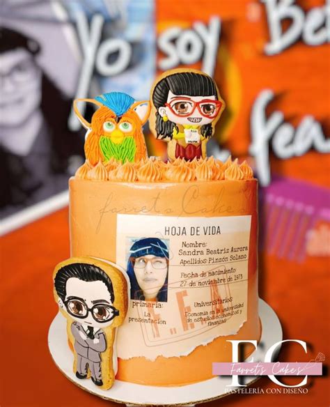 An Orange Cake With Three Cartoon Figures On Top