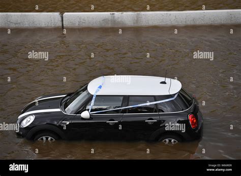 Car Stranded In Flood Water On The A Near Handforth Hi Res Stock