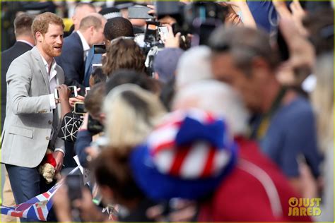 Prince Harry Greets Spectators With Best Man Prince William Ahead Of