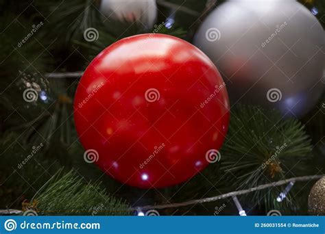 Red Ball Ornament On Christmas Tree Stock Photo Image Of Celebration