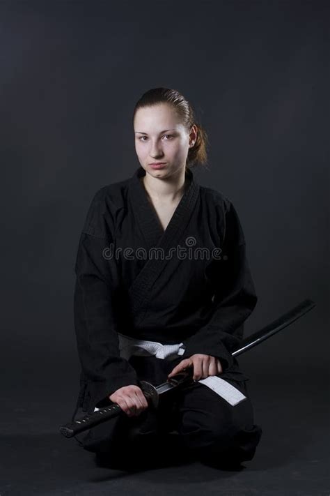 Female Samurai Holding Katana Picture Image