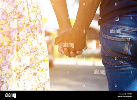 Couples Holding Hands Stock Photo Alamy
